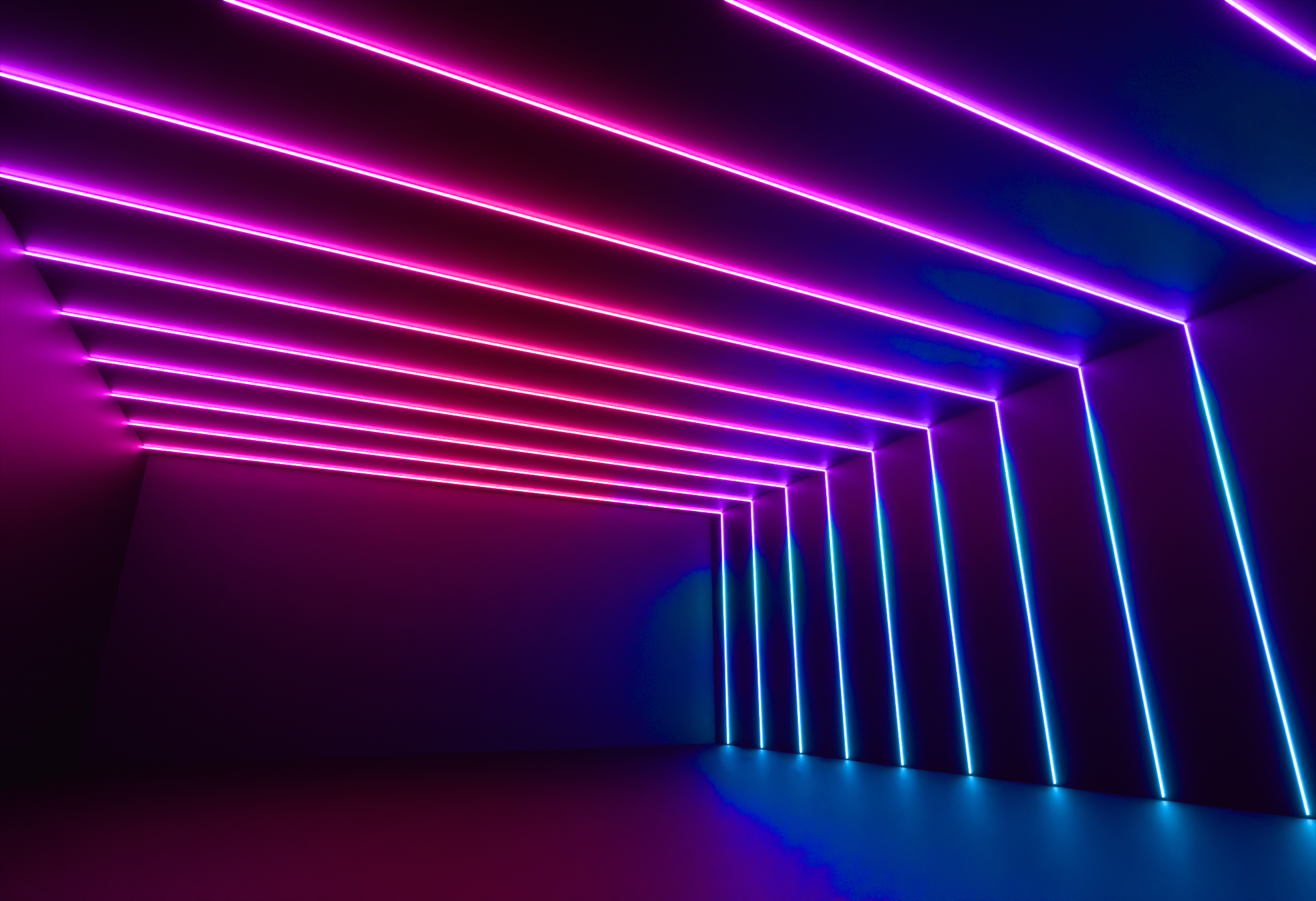 Angled view of Sunset Portal light lines running up a wall and across the ceiling